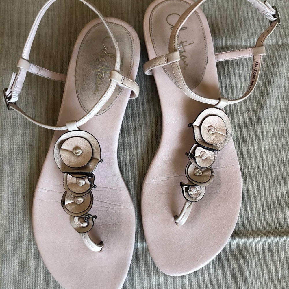 Cole Haan Halsey leather sandal with floral motif.